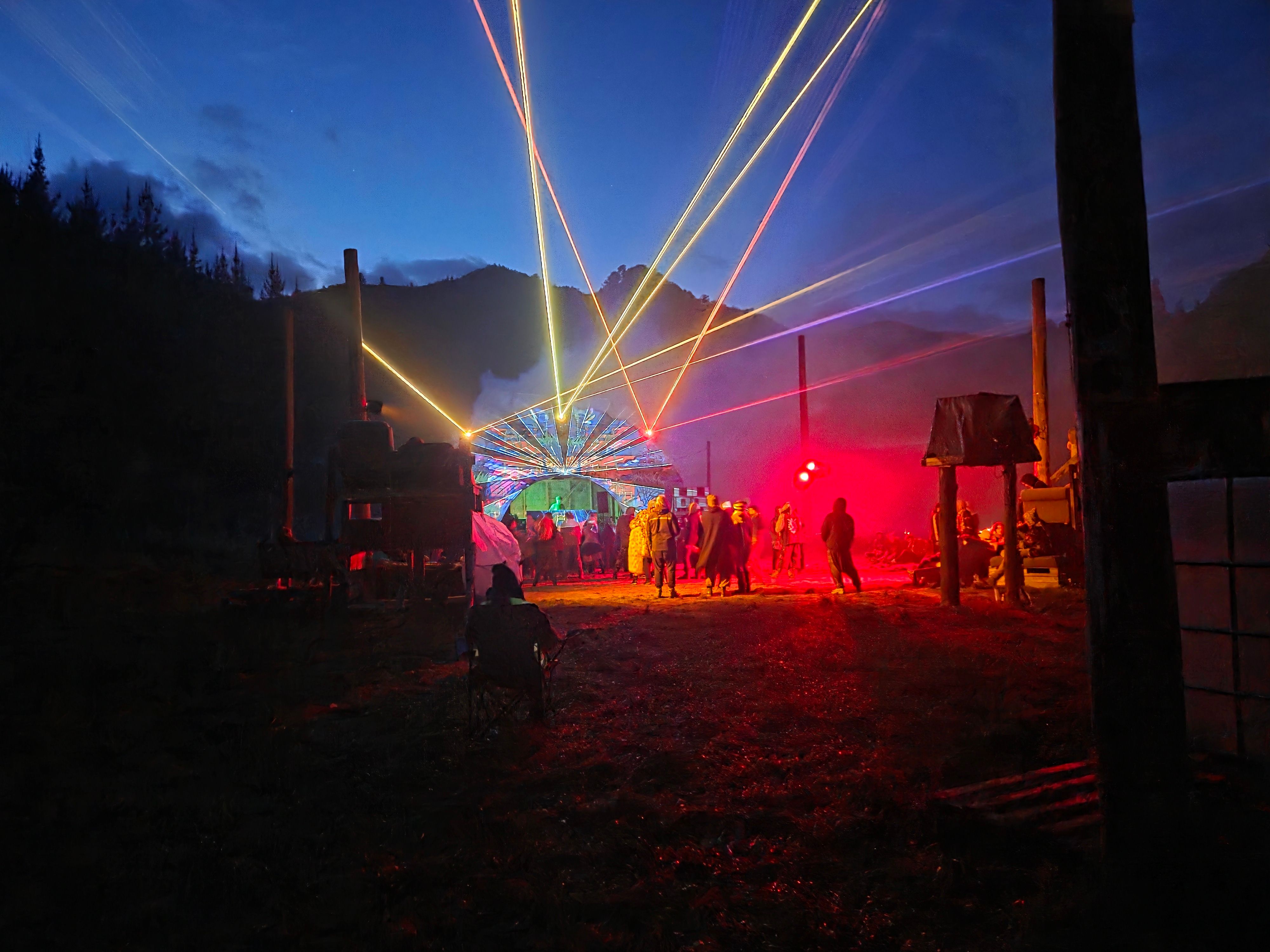 Meticulously mapped visuals on a textured stage, with lasers and warm lighting adding to the vibe