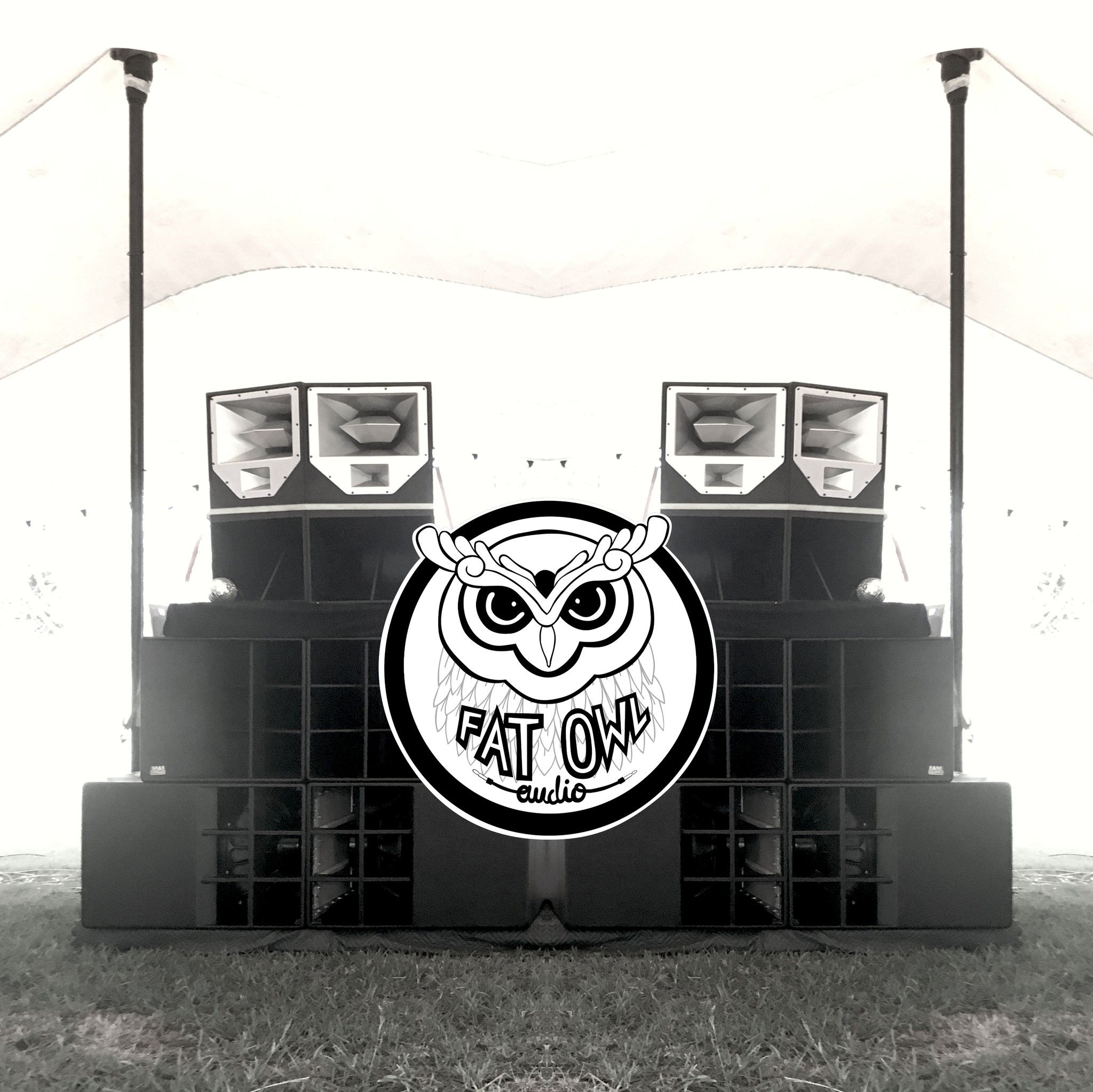 The rig is in two symmetircal stacks under a stretch tent, with the logo overlaid over the image