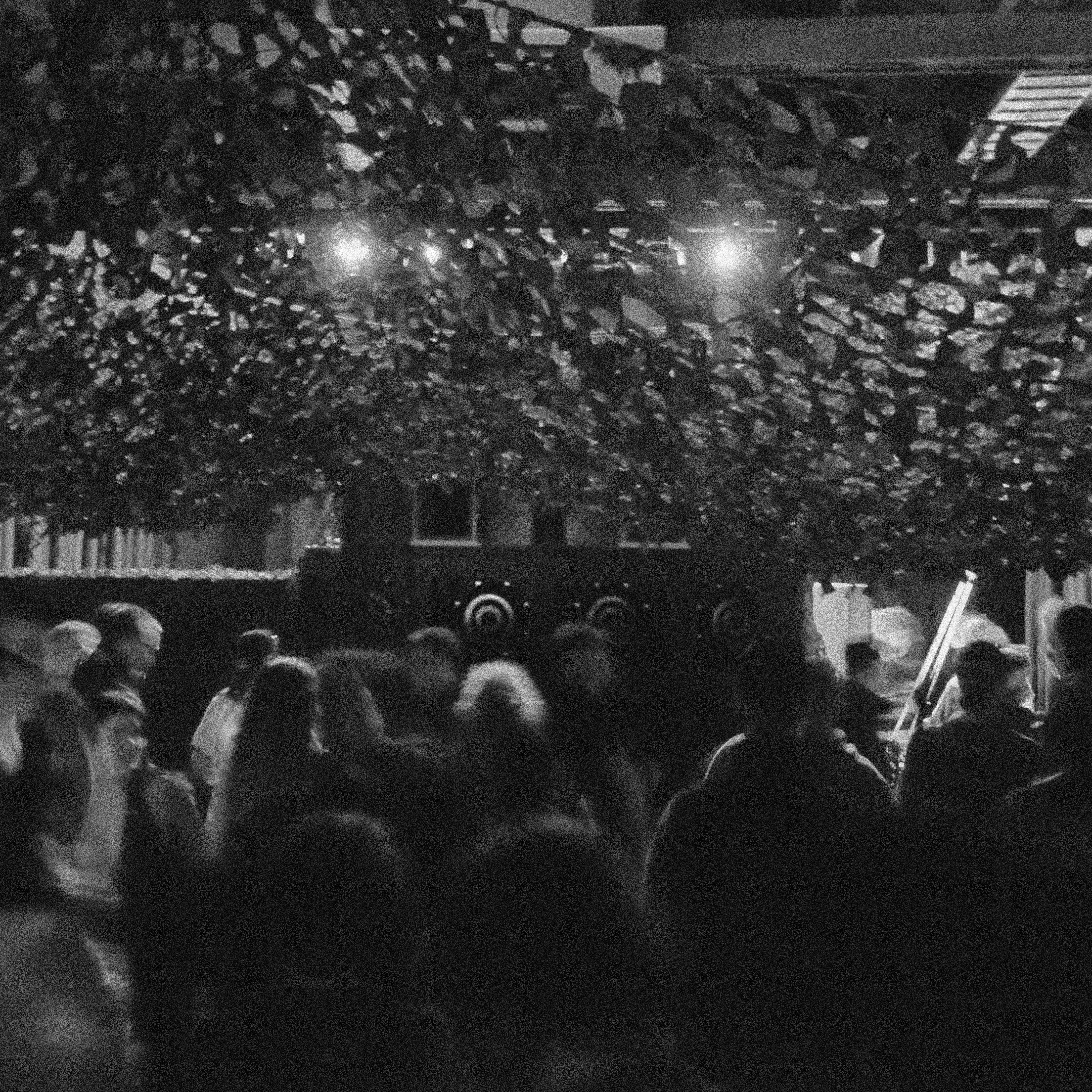 A black and white photo of a crowd